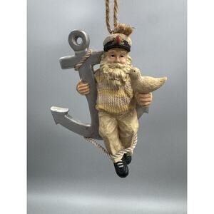 Nautical Sailor Santa Sitting On Anchor Holding Bird Resin Ornament 3.75”